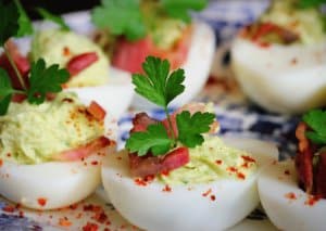 Deviled eggs topped with fresh herbs and light seasoning in the Southeastern Michigan area