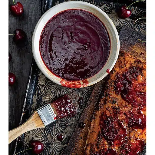 Cherry barbecue sauce made with Michigan cherries served with grilled meat.